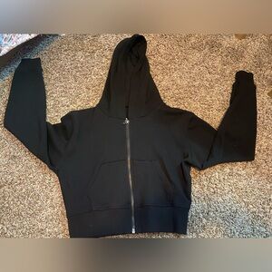 Basically brand new, cropped, black zip up